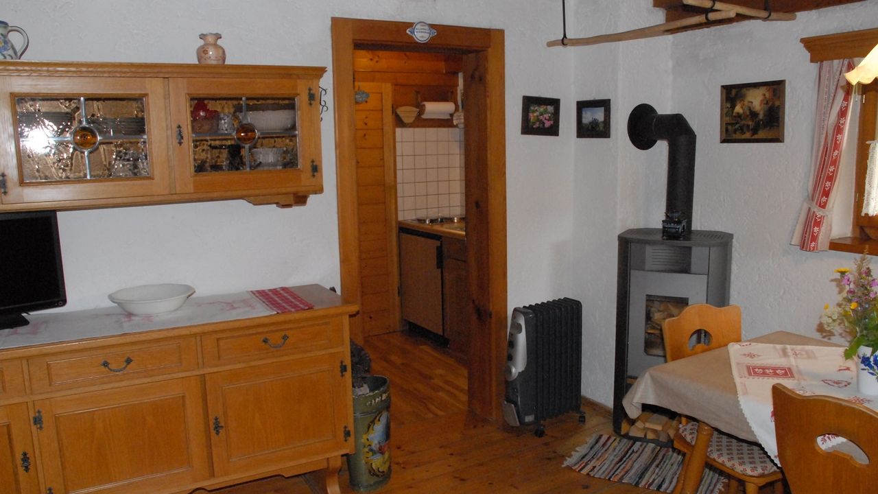 Ferienhäuschen Rosi - Wohnbereich mit gemütlichem Ofen Ferienhäuschen Rosi - Wohnbereich mit gemütlichem Ofen